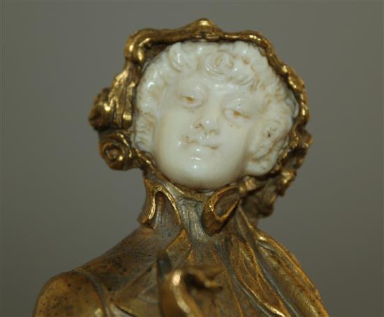 Rene Paul Marquet (French, 1879-1939). A gilt bronze and ivory figure of a lady wearing a bonnet, 10.25in.